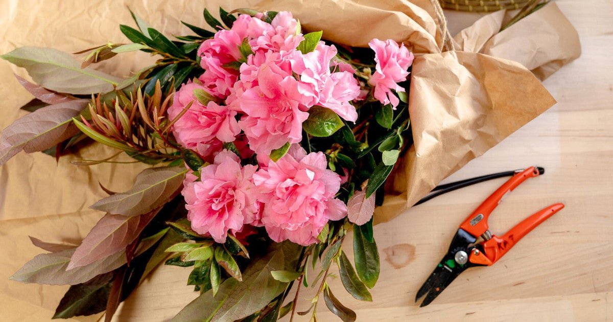 Bouquet of flowers with cut pink Azalea flowers